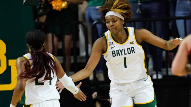 Mar 6, 2022; Waco, Texas, USA; Baylor Lady Bears forward NaLyssa Smith (1) and guard Sarah Andrews (24) celebrate after a play against the Texas Tech Red Raiders during the first half at Ferrell Center. Mandatory Credit: Chris Jones-USA TODAY Sports